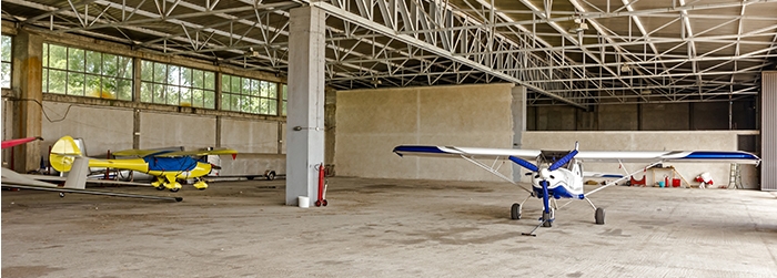 Research on Air Stratification in Airport Hangars with Low Speed and High Airflow Fans